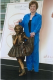 Shirley Temple with statue